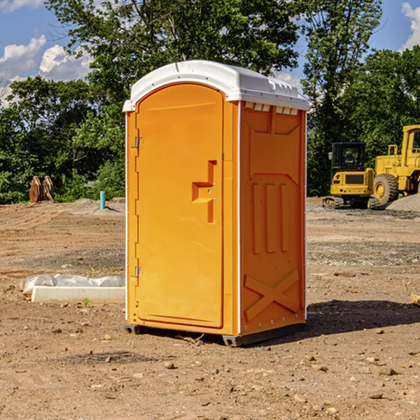 how often are the portable restrooms cleaned and serviced during a rental period in Ackley IA